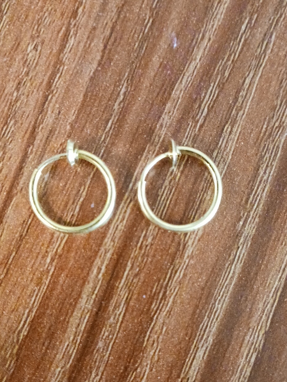 Gold Tone Spring- Loaded Hoop Earrings Designed Specifically For Unpierced Ears.